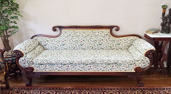 Beautiful Antique Sofa with a wooden frame