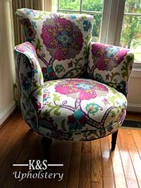 Reupholstered floral centered chair