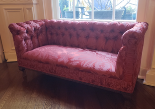 Lovely vintage sofa with a tufted back