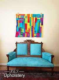 Tiffany blue chair brings out the blue in the painting behind it